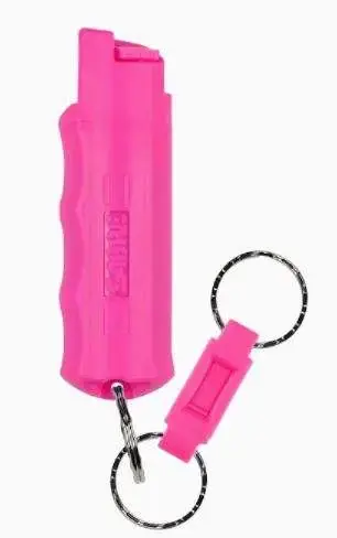 The SABRE Pepper Spray with Quick Release Key Ring contains 25 bursts and has a 10-foot (3-meter) range. Features a twist lock safety and has an ergonomic finger grip. Supports the National Breast Cancer Foundation (NBCF). Pink color.